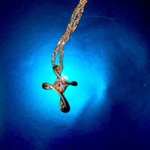 Silver crossed with a rhinestone and silver chain